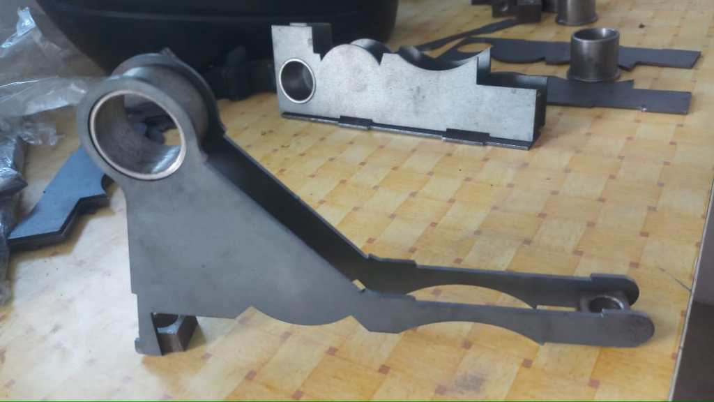 Moved from machined to laser cut parts reduce reduce and cost